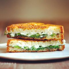 A picture of Truffled ricotta + arugula grilled cheese.