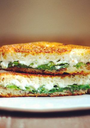 A picture of Truffled ricotta + arugula grilled cheese.