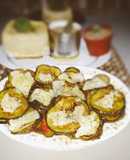 Berenjenas con tomates caramelizados y queso
