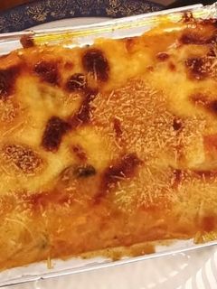 Una foto de Lasagna de pollo, jamón y champiñones