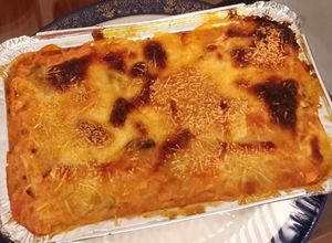 Una foto de Lasagna de pollo, jamón y champiñones