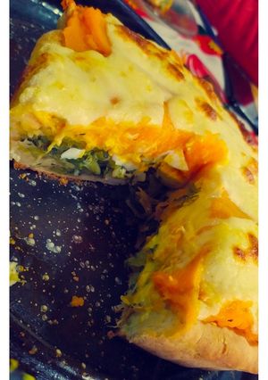 Una foto de Tarta bicolor de zapallo y acelga