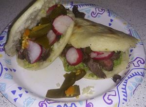 Una foto de Arepa de asada