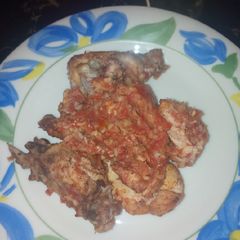 A picture of Oven baked tomato cinnamon chicken.