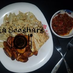 A picture of Fries and sauce.