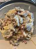 Spaghettis con salsa de champiñones y bacon