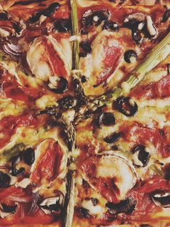 Una foto de Pizza de verduras
