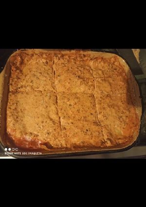 Una foto de Lasaña con pino vegetariano