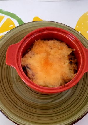 Una foto de Arroz con choritos gratinados