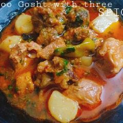 A picture of Aloo Gosht with three Spices.