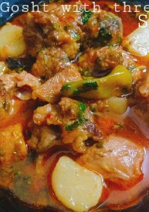 A picture of Aloo Gosht with three Spices.