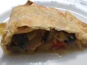 Una foto de calzone berenjena