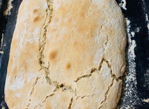 Una foto de Pan ciabatta rico y crujiente