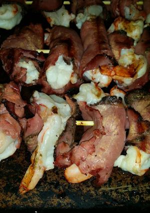 A picture of Brad's pastrami wrapped coconut prawn skewers.