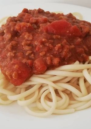 Una foto de Salsa con carne y longaniza