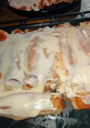 Una foto de Canelones de carne picada
