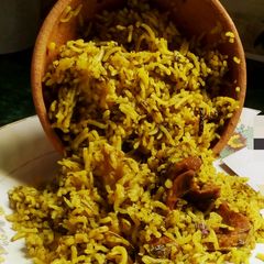 A picture of Spinach mutton biryani.
