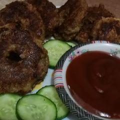 A picture of Aloo or keemy ke donuts.