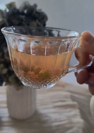 Una foto de Ponche de membrillo y uvas