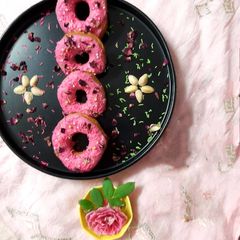 A picture of Beetroot Donuts with Strawberry Glaze.