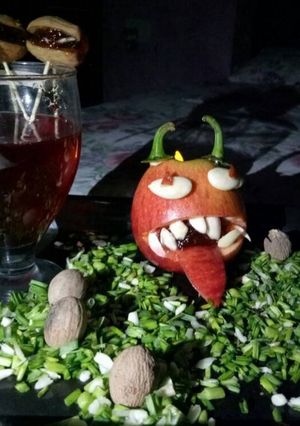 A picture of Dents De vampire with glass of blood.
