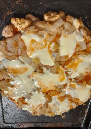 Una foto de Pizza de pollo