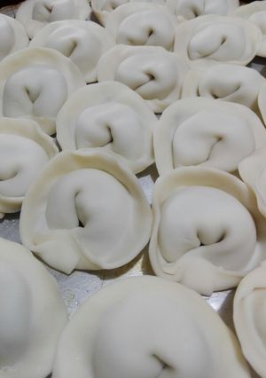 Una foto de Agnolotti de acelga y pollo