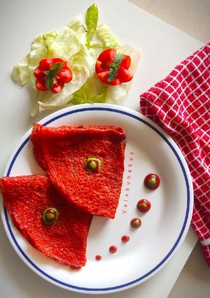A picture of Savoury Tomato Crêpes with Fresh Green Dip.