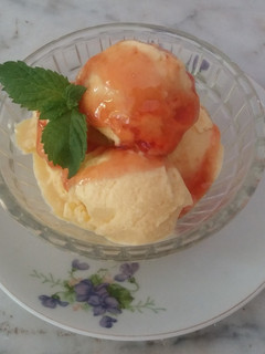 Una foto de Helado de Yogurt sabor Mango