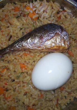 A picture of Garnished jollof rice.