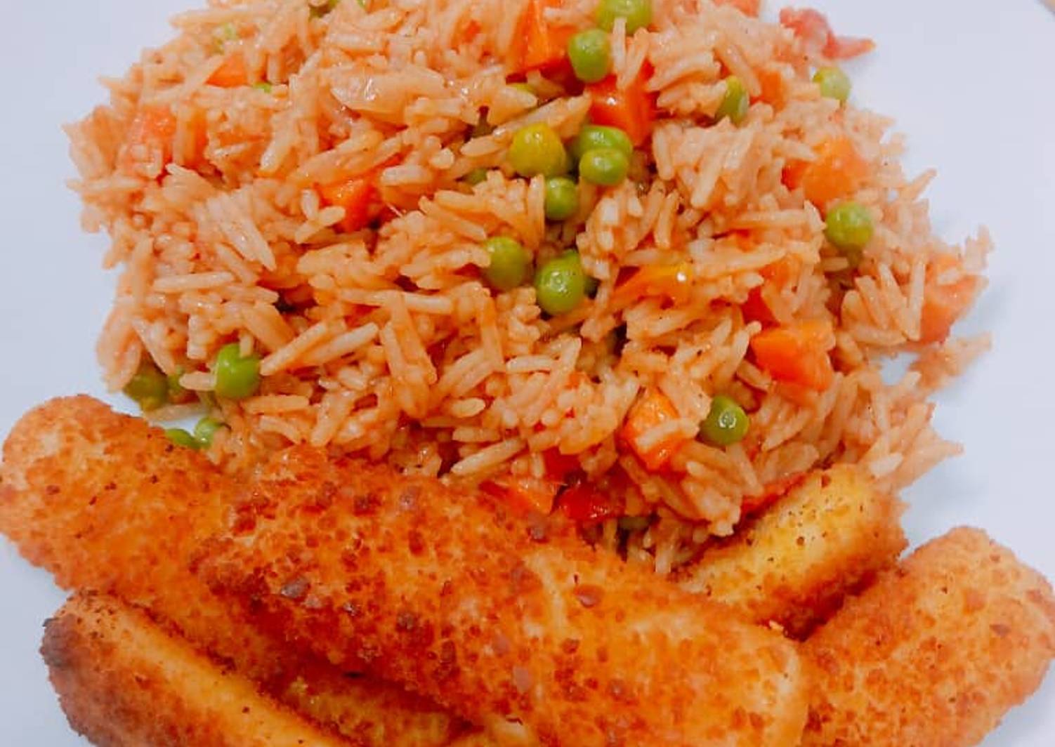 Simple jollof rice with crispy fish finger Recipe by Mike Esther Onaji