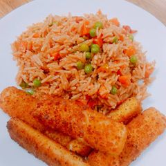 Simple jollof rice with crispy fish finger A picture of Simple jollof rice with crispy fish finger.