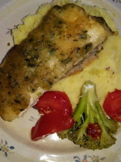 Una foto de Pescado frito con puré