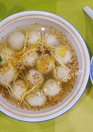 A picture of Red Bean Mochi Dumplings in Ginger Syrup.