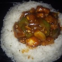 Chilli paneer with jeera rice A picture of Chilli paneer with jeera rice.