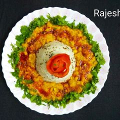 A picture of Dal Tadka With Jeera Rice.