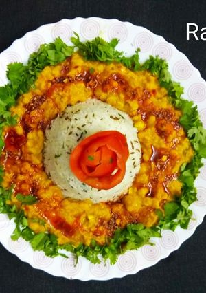 A picture of Dal Tadka With Jeera Rice.