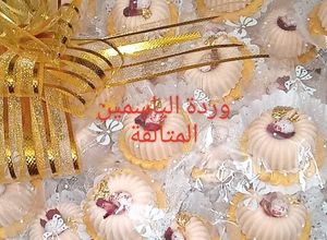 صورة لوصفة حلوة بريستيج بحشو غاناش جوز الهند مع قاعدة صابلي اللوز