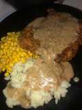 Country fried steak with beef pepper gravy