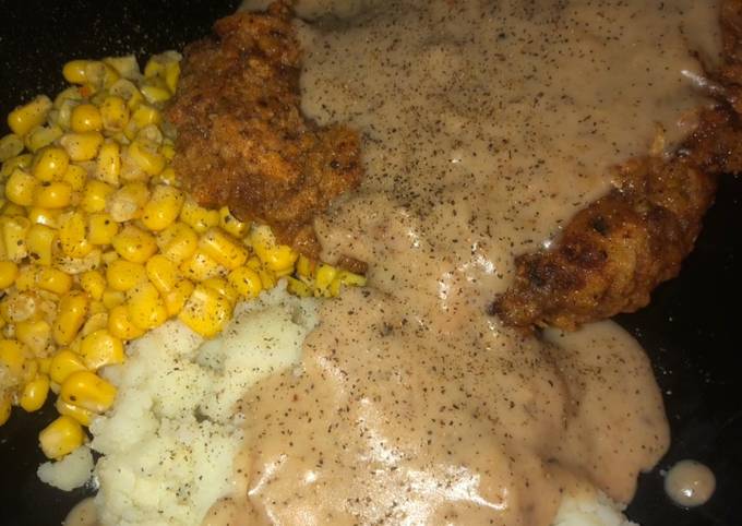 Country fried steak with beef pepper gravy