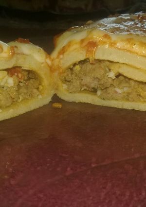 Una foto de Canelones de carne y acelga a la pizza