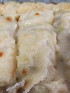 Una foto de Canelones de calabacín rellenos de atún