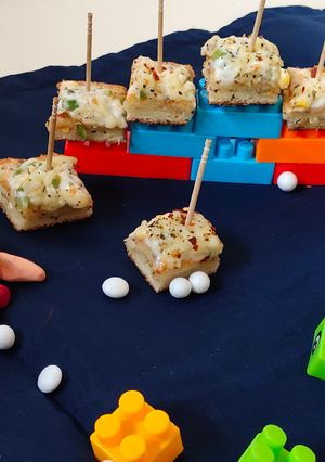 A picture of Mini cheesy sandwich bites.