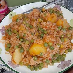 A picture of Vegetable Rice with Potatoes.