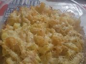 Una foto de patata en salsa bechamel