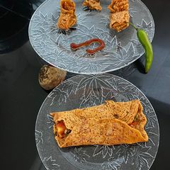 A picture of Sprouted Moong stuffed Beetroot Chilla.