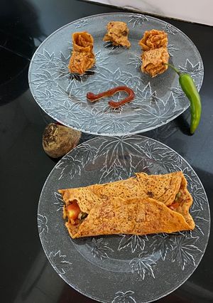 A picture of Sprouted Moong stuffed Beetroot Chilla.