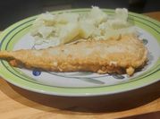 Una foto de filet de merluza a la sarten