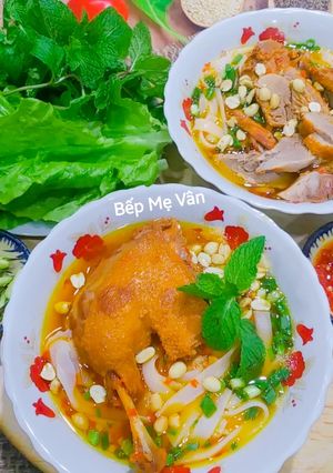 A picture of Duck Quang-Style Noodles (Mi Quang Vit).