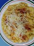 Fideos con salsa de zapallo y queso